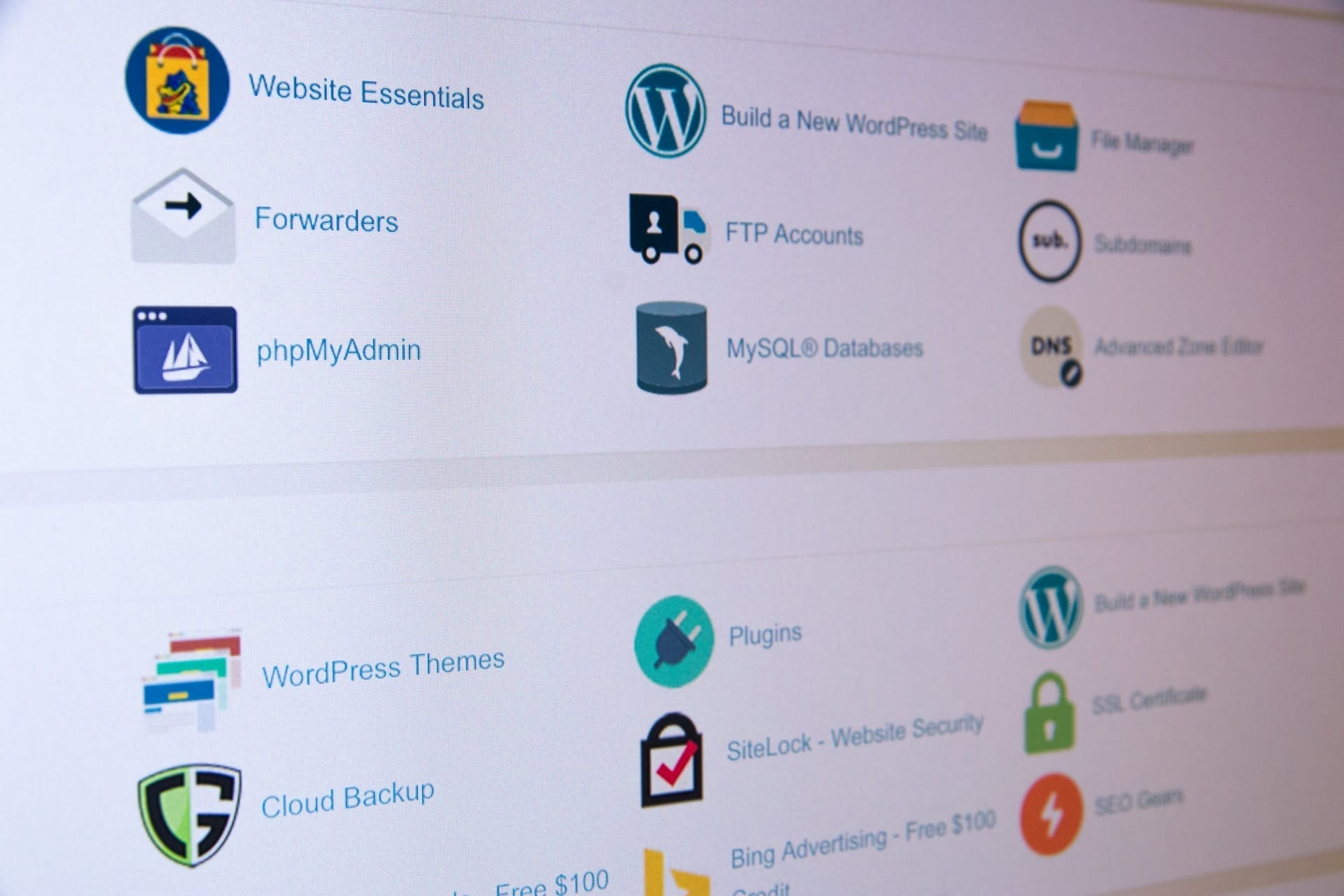 A computer screen displaying wordpress icons for website development.